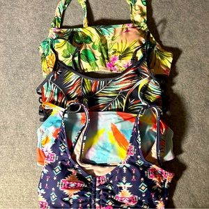 4 bikini tops. All size Medium. Great condition.